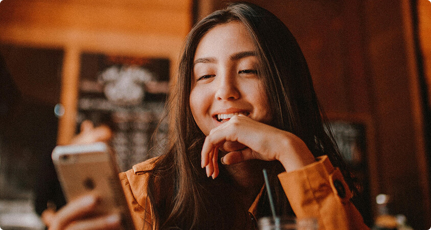 Woman smiling during video call
